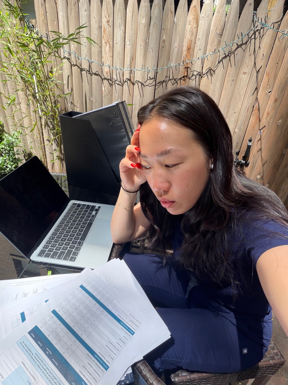 Ashley reviewing QUAD-A certification paperwork